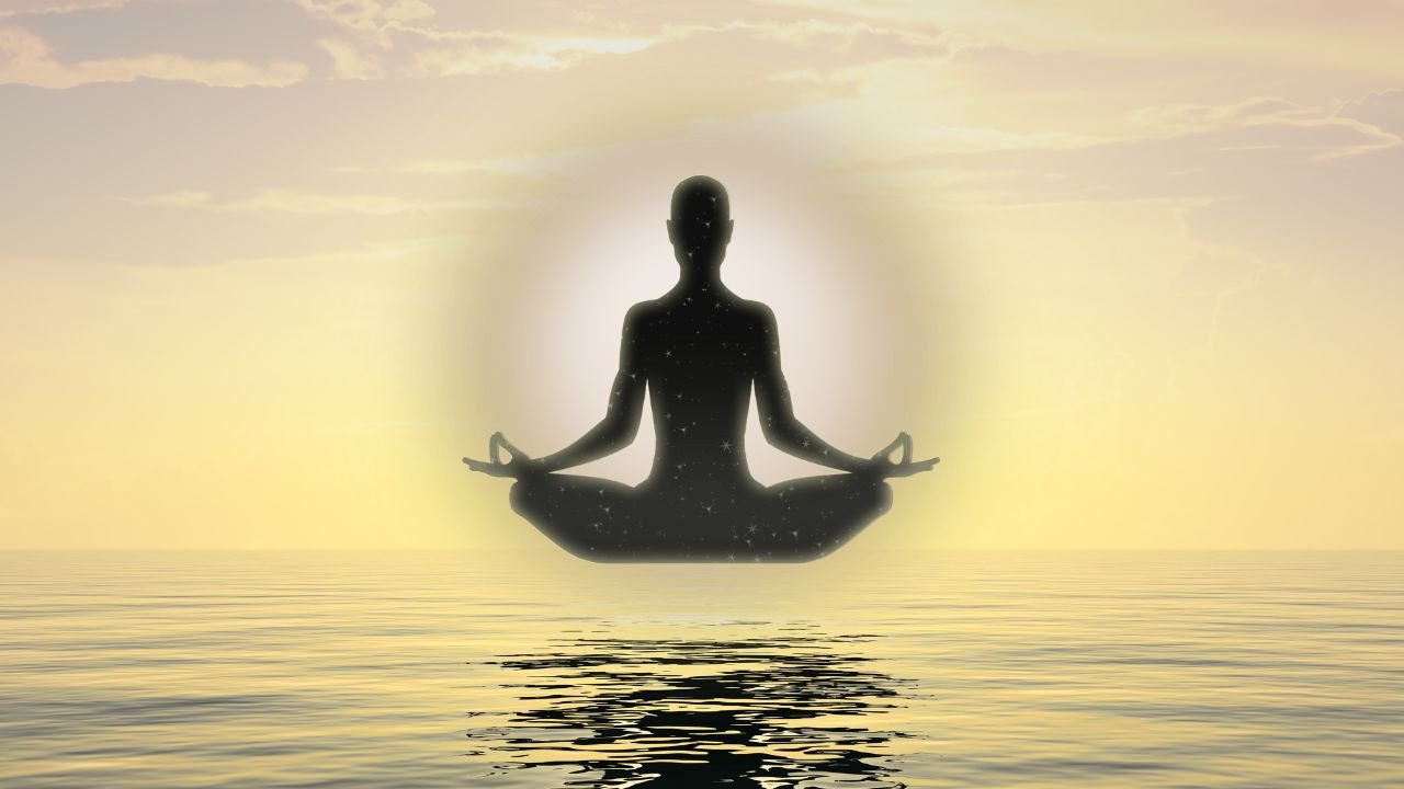Illustration of a person meditating or practicing mindfulness, with soft, glowing light surrounding them, symbolizing the flow of prana or life energy in pranic healing.